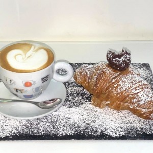 Croissant  with butter and  jam